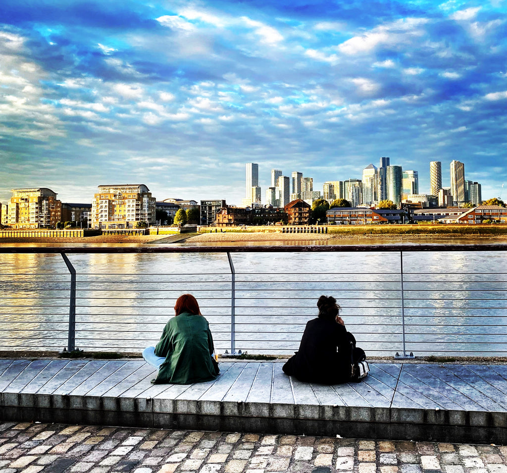 Greenwich Riverside with two people in foreground